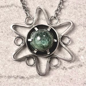 Artisan made sterling silver star and green stone necklace.